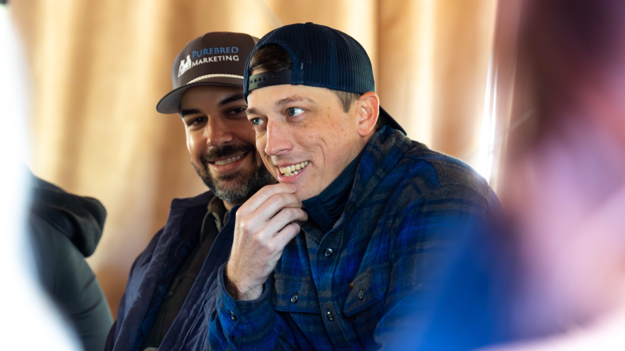 Two founders laughing at Digital Agency Experience