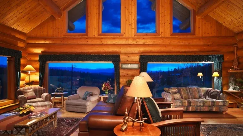 The lodge interior at Echo Valley Ranch at dusk
